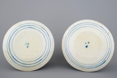 A fine pair of Dutch Delft blue and white plates, 18th C.